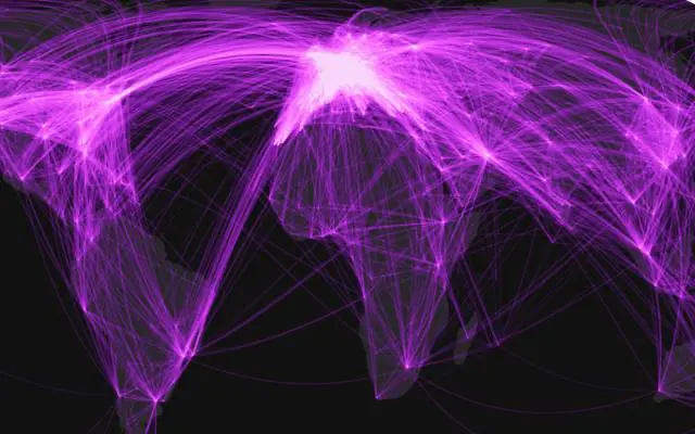 World flight paths shown as bright violet lines across a dark world map.